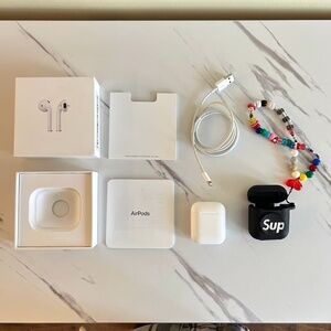 Apple AirPods with Box, Charger Cable, Silicone Case, and Lanyard